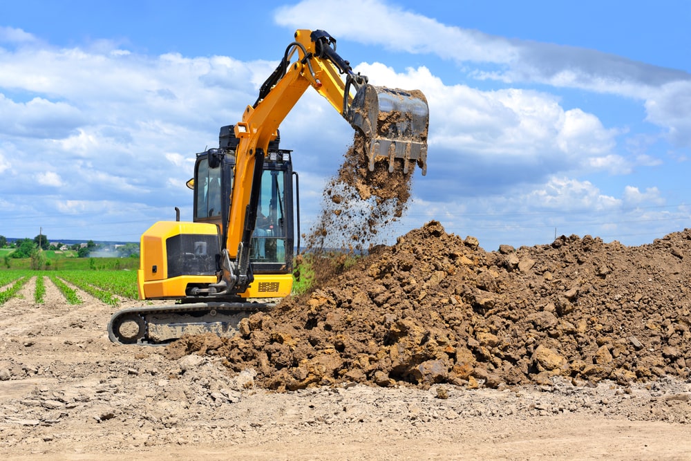 Excavating land